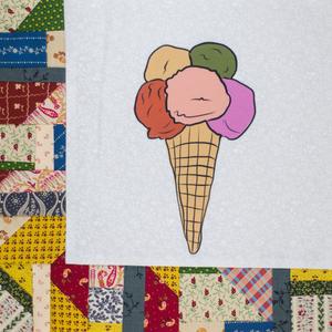Multicolored icecream scopes in a cone.