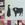 A silhouette of a woman and a cow.