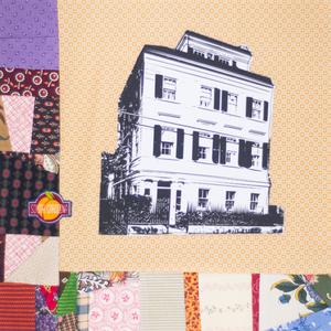 A white 4-storey house.