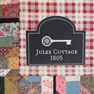 A headstone with a key that reads "Julee Cottage 1805".