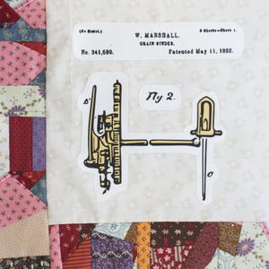 A drawing of a grain binder and its parts.