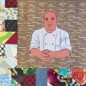 Todd Richards smiling in a white chef coat.